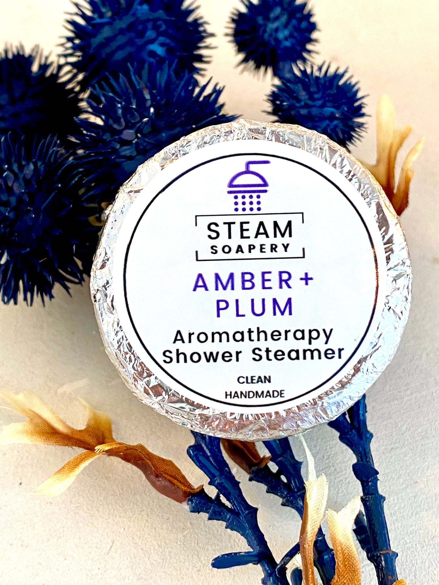 Amber + Plum Shower Steamer handmade by Steam Soapery