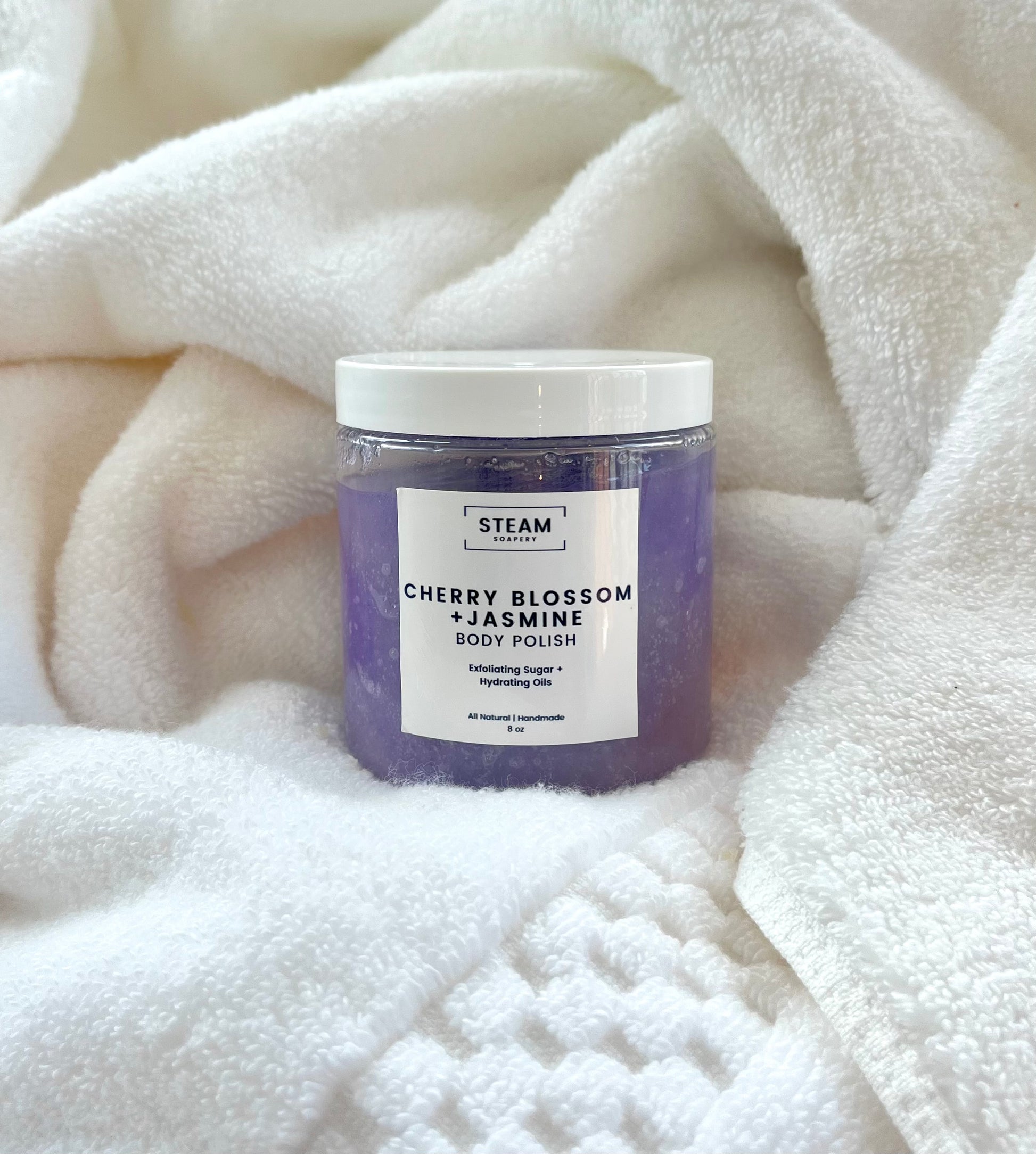 Cherry Blossom Jasmine Body Scrub on White Towel