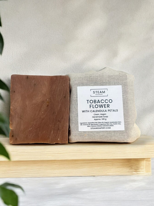 Tobacco Flower Soap bar with shea butter and kaolin clay, offering a musky floral fragrance and moisturizing cleanse